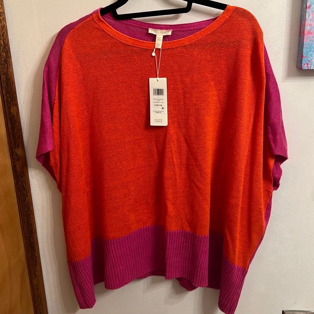 Eileen Fisher sweater. Exclusive to Saks New with tags, never warn.
